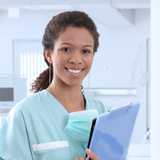 nurse holding record book