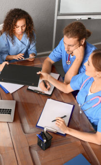 group of nurses having a meeting